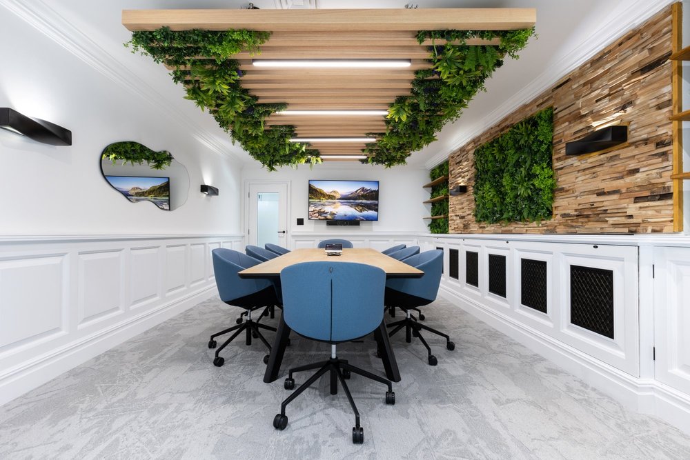 View along the Healthspan meeting table towards the video screen