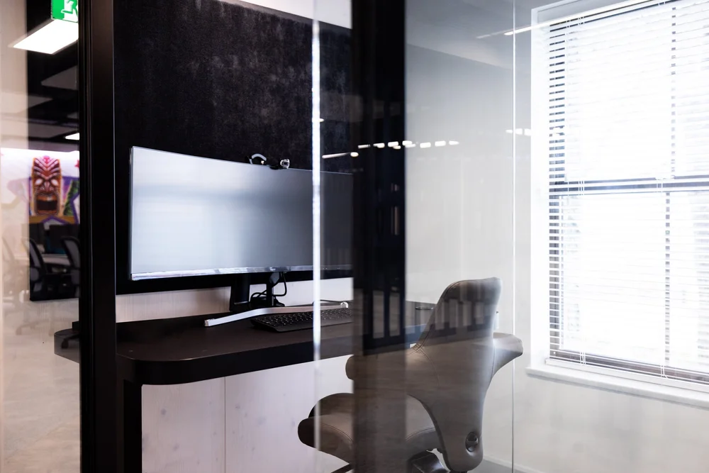 Quiet pod with task seating and screen