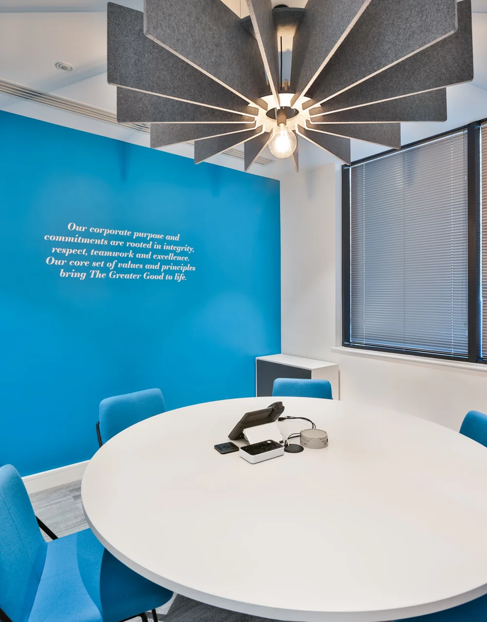 Small meeting room with branded wall graphics