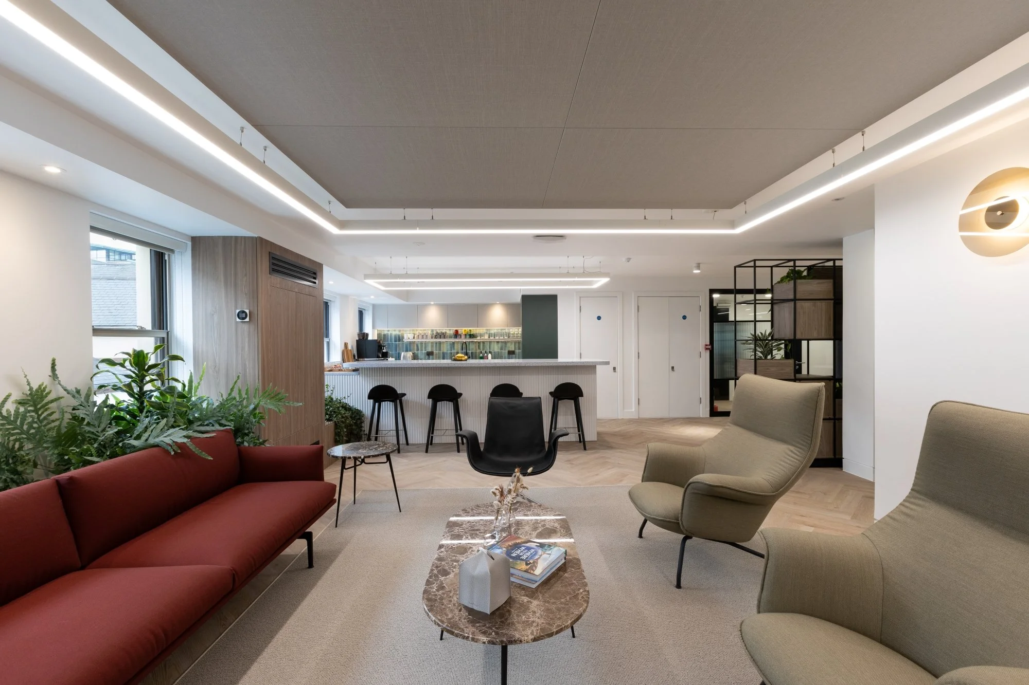 Café and lounge at the private investment company’s Weighbridge House office
