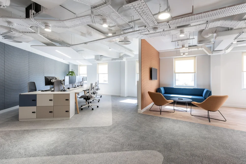 Momentum Wealth International’s open-plan office and lounge at La Plaiderie House