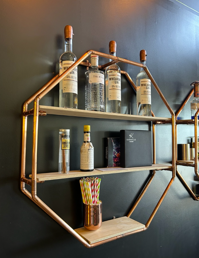 Copper pipe and timber wall-mounted display shelving, actual sale item