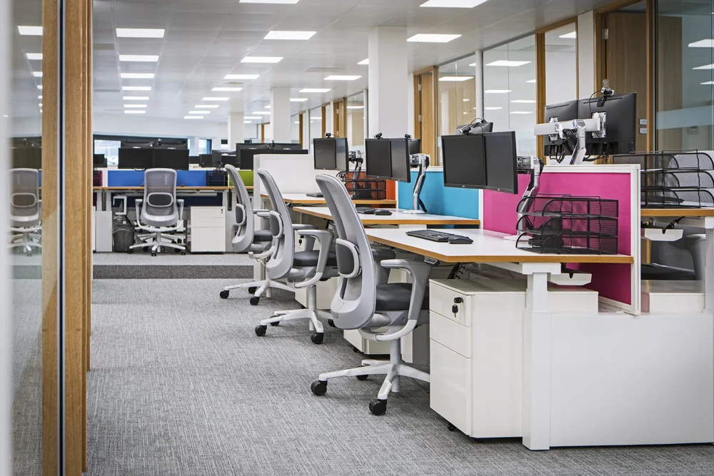Task seating and personal storage along the office floor
