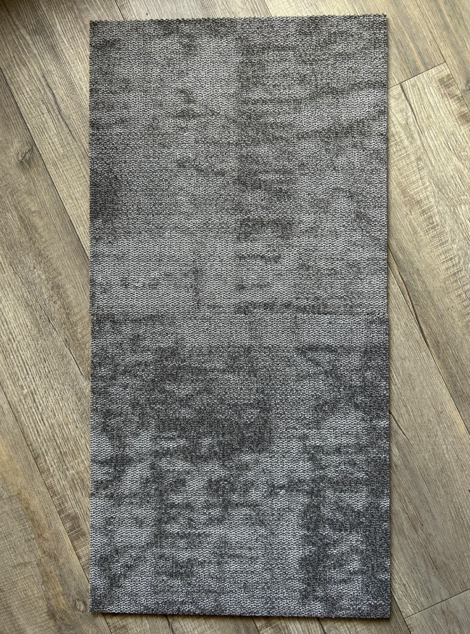 Milliken Unexpected Purpose Rewritten carpet tile in grey, actual stock
