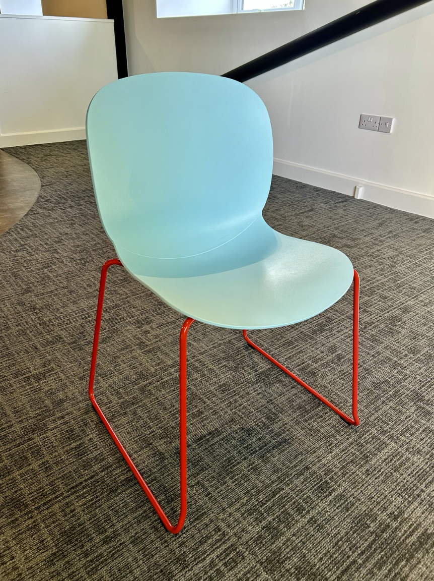 RBM Noor chair with pale blue shell and red sled base, actual sale item