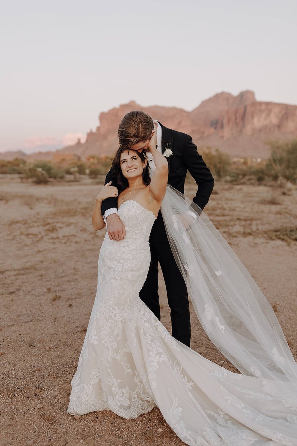 Bride and groom in the desert for Arizona destination wedding