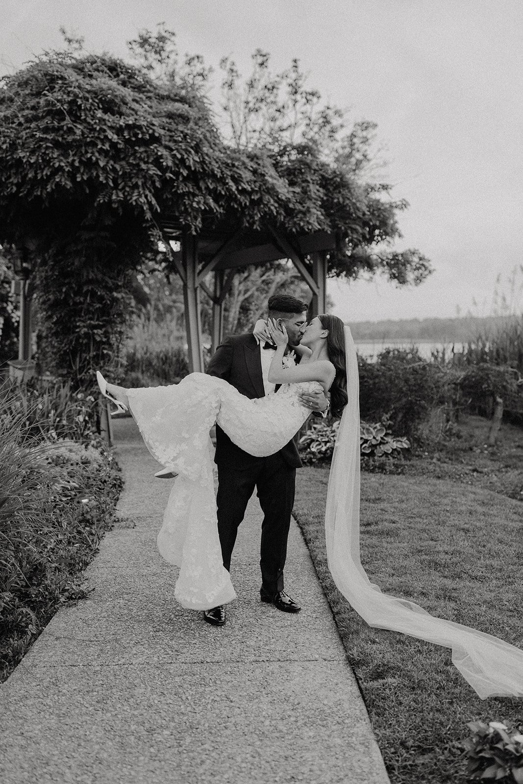 Black and white photo of bride and groom at New York destination wedding