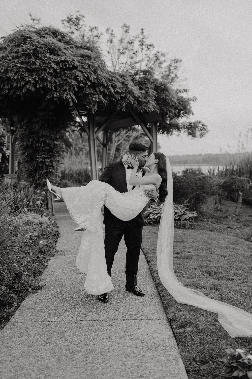 Black and white photo of bride and groom at New York destination wedding