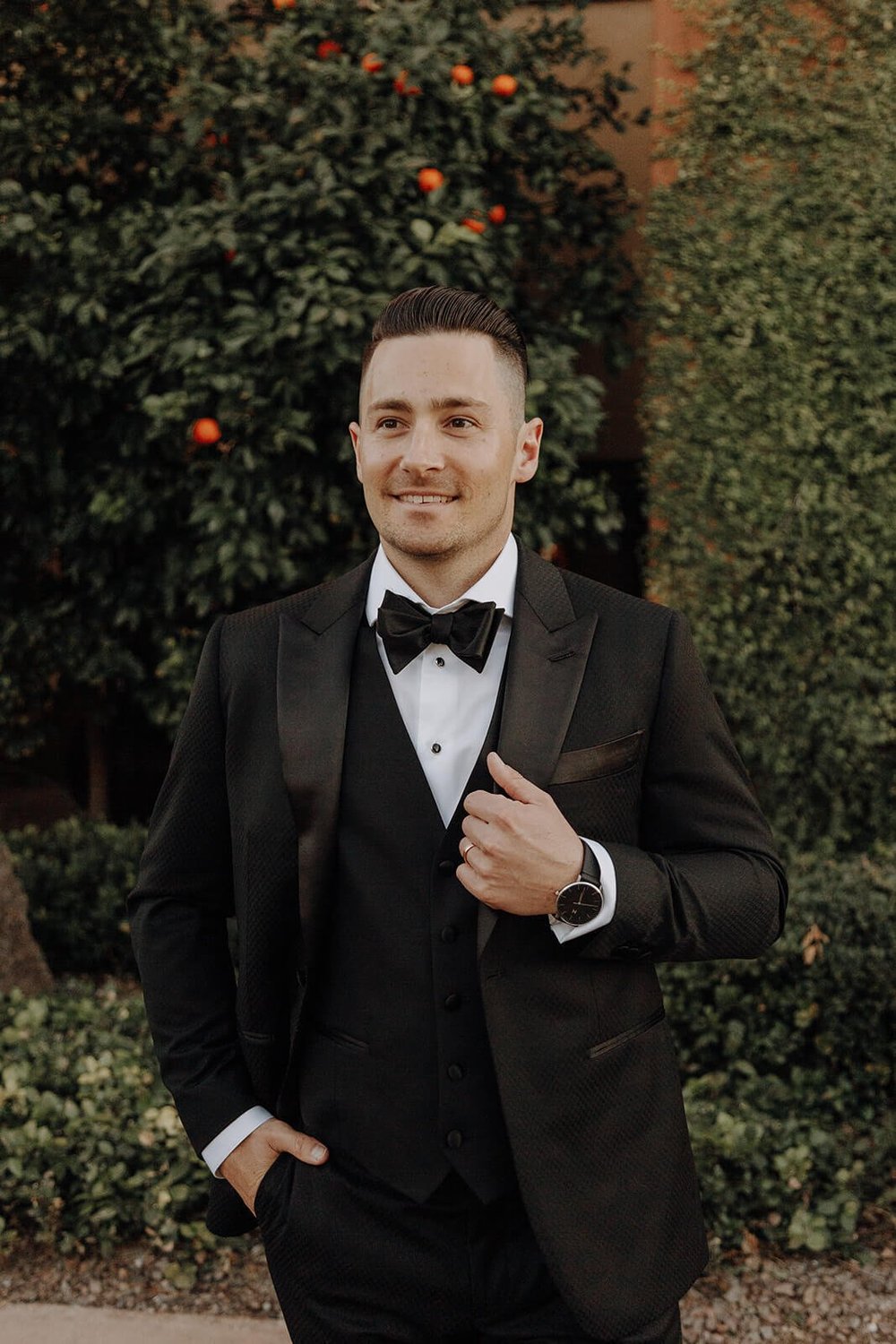 Groom standing outside at Blackstone Country Club wedding