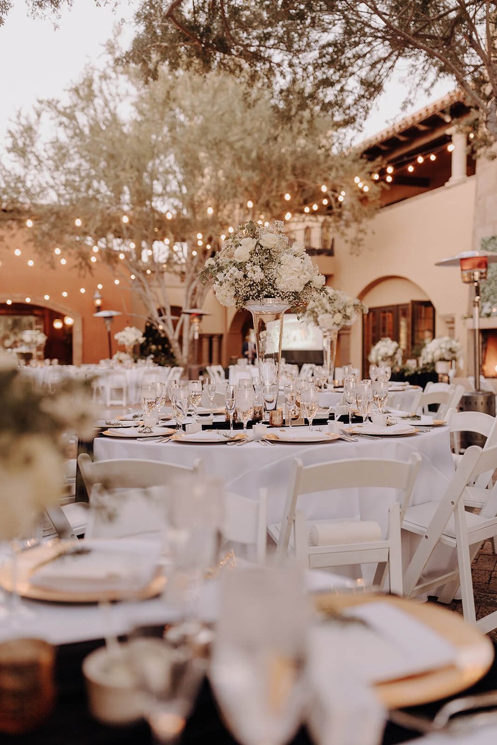 Elegant reception space with decorated tablescapes at Blackstone Country Club wedding