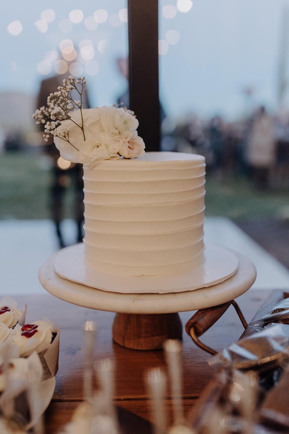 Simple and elegant white wedding cake at Arizona destination wedding