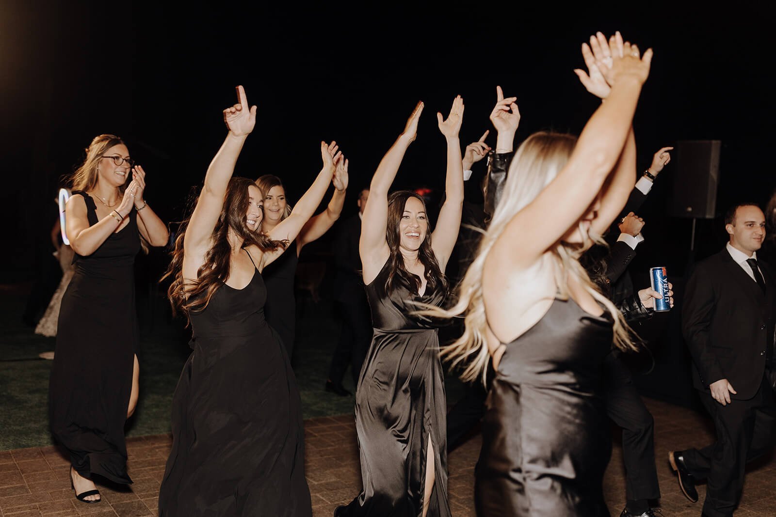 Bridal party dances at reception of Arizona destination wedding