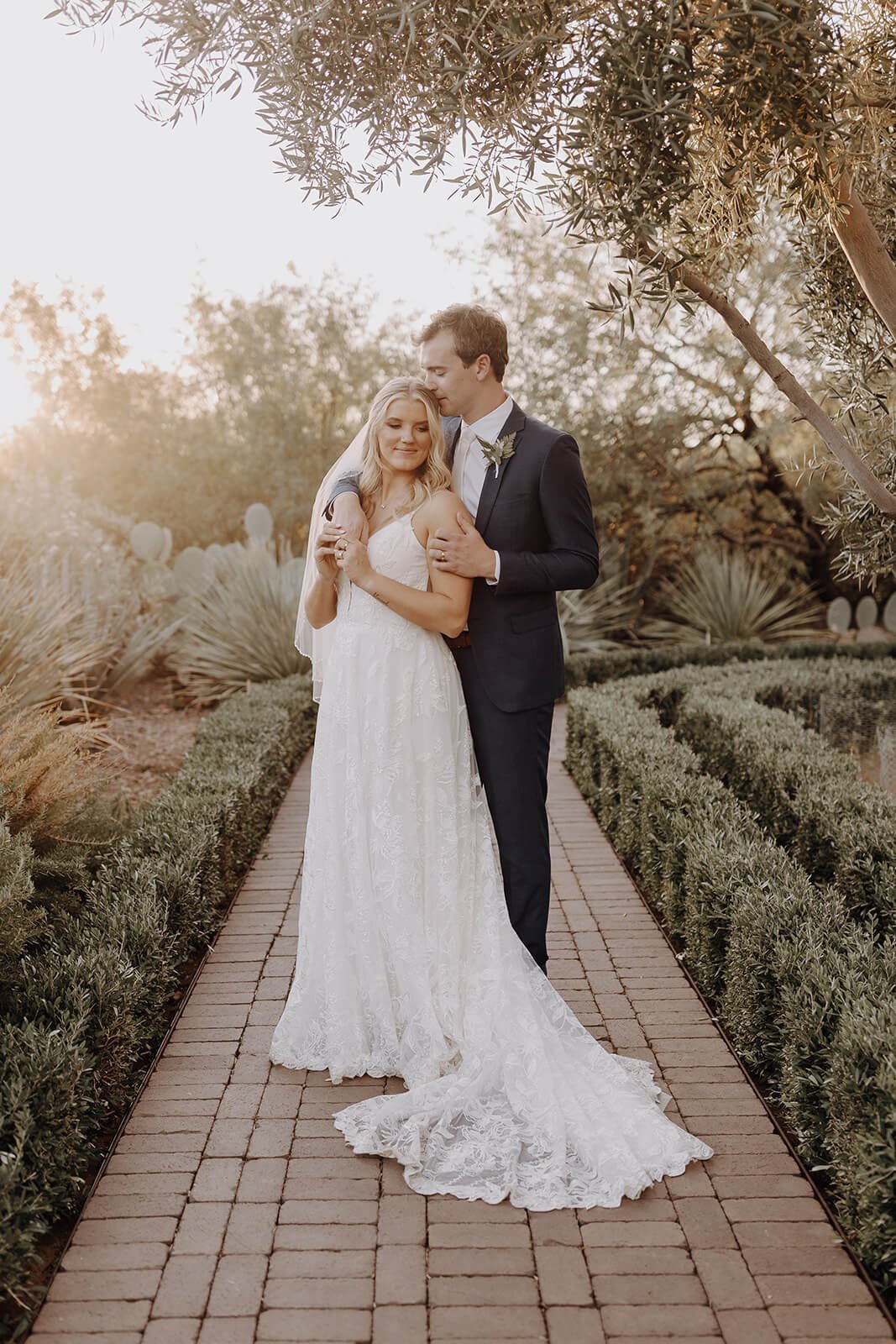 Bride and groom on a desert path