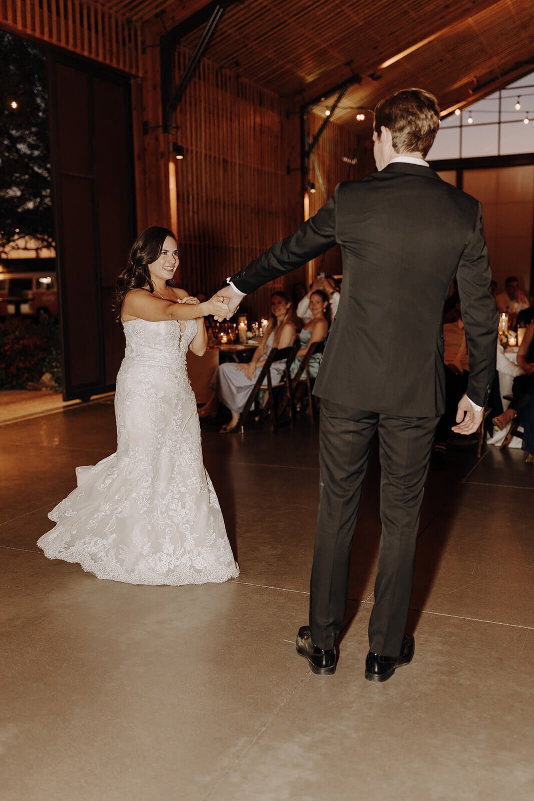 Bride and groom dance on the dance floor at The Paseo wedding venue