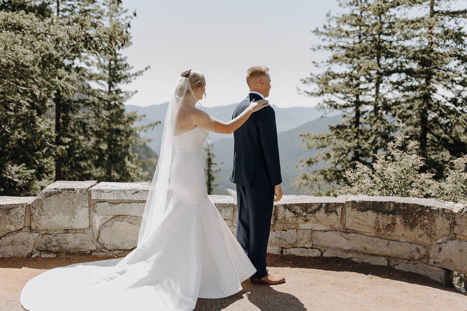 Bride and groom first look at Mount Rainier wedding