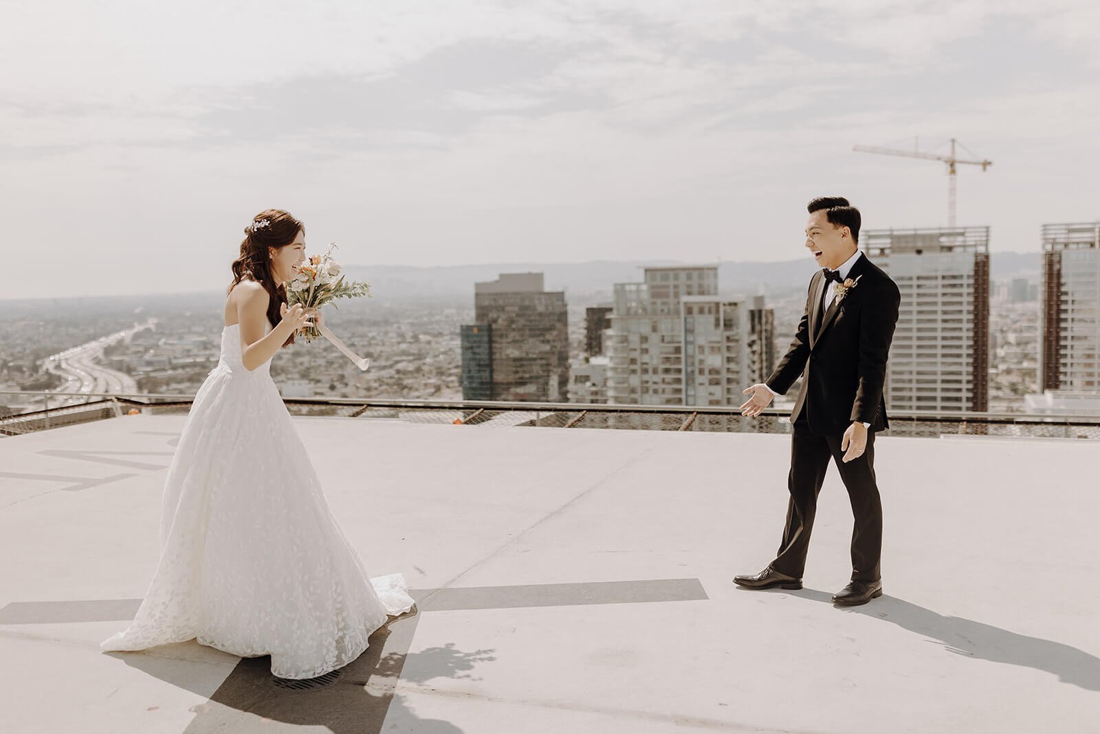 Bride and groom first look overlooking LA