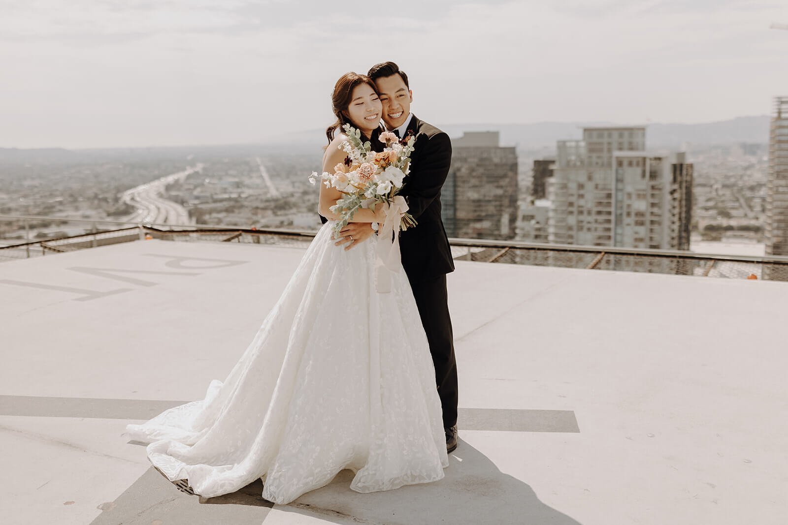 Bride and groom couple portraits at city wedding