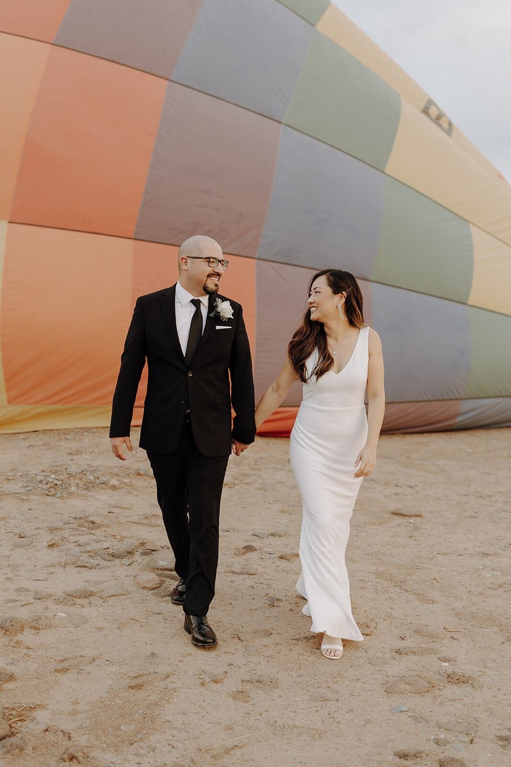 Bride and groom hot air balloon elopement portraits