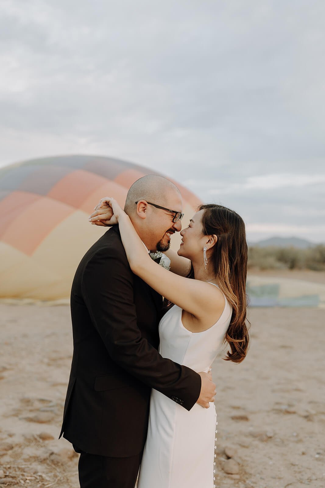 Bride and groom hot air balloon elopement portraits