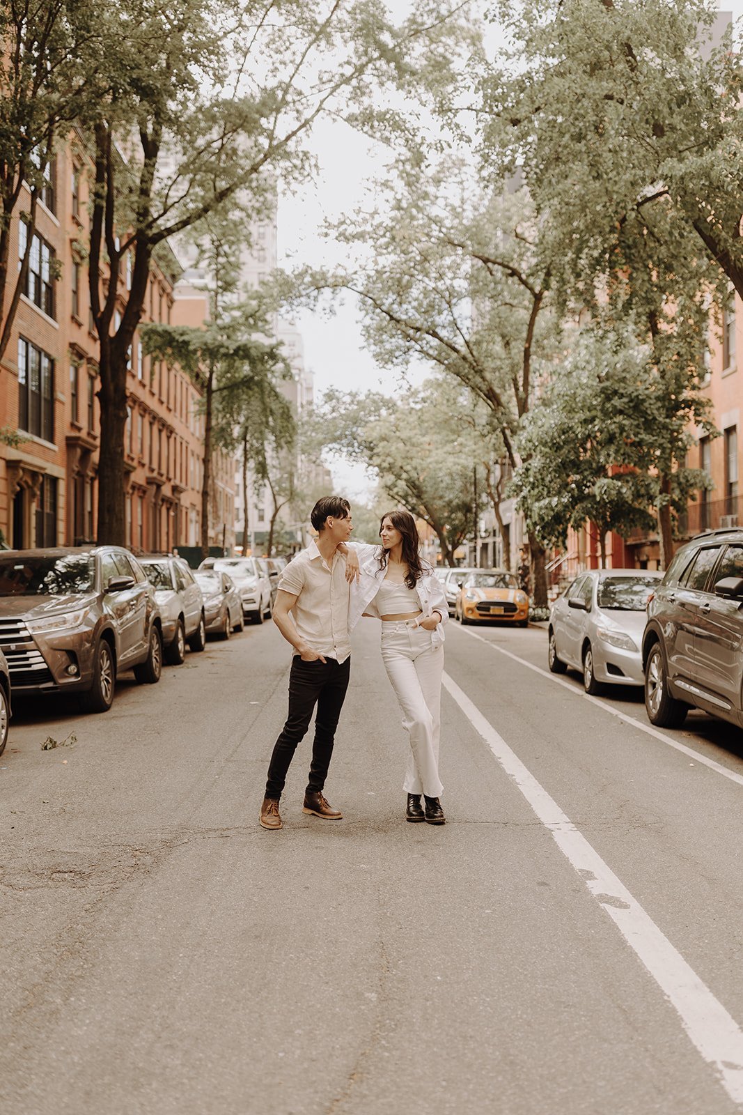 Couple standing in the street during New York City Engagement Session in Manhattan