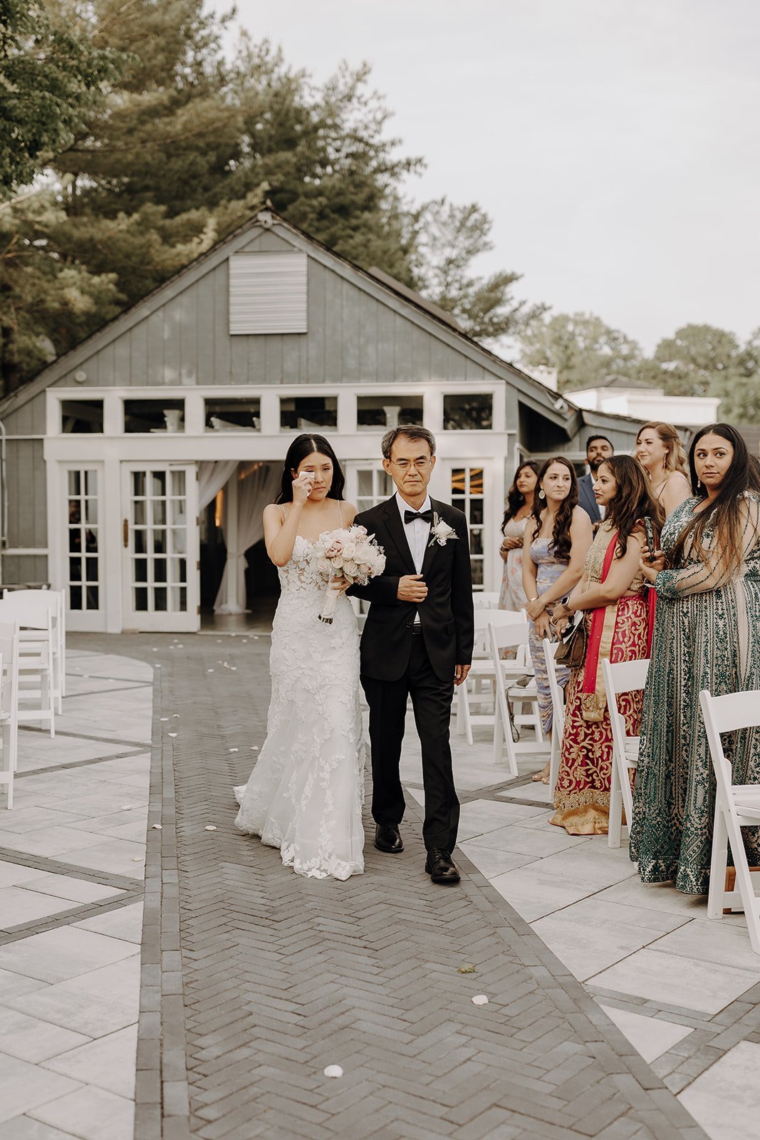 Bride walks down the aisle with father for city wedding in NY