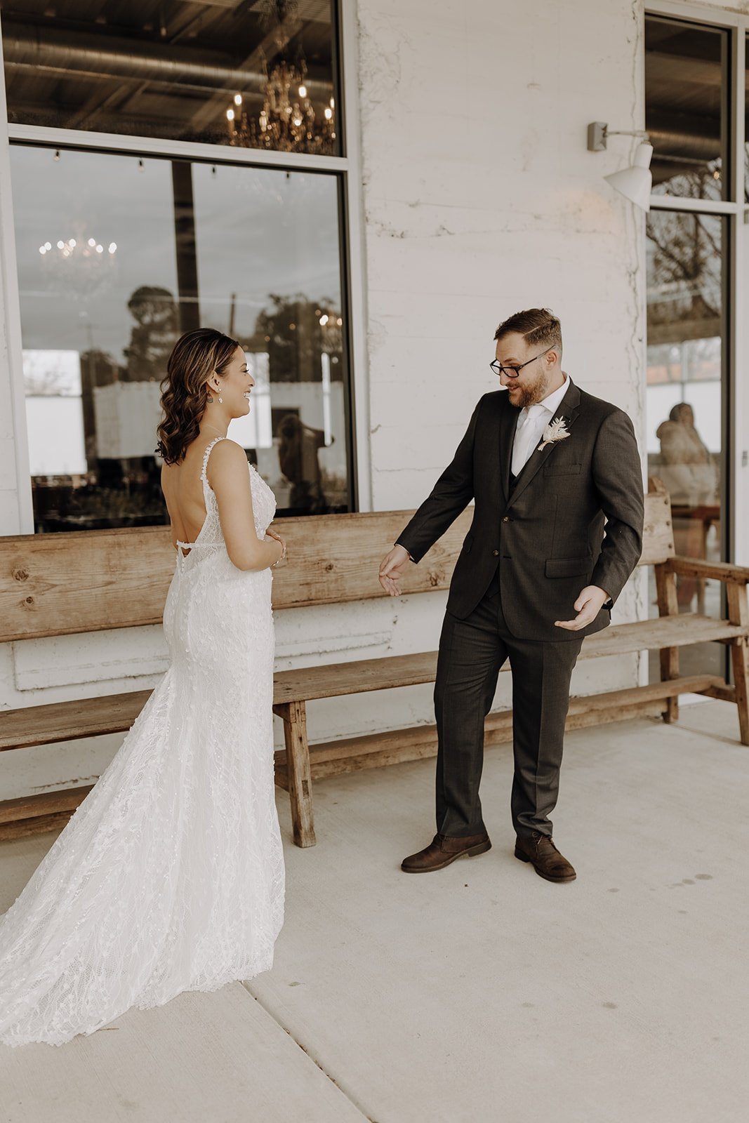 Groom reacts during the first look at Austin wedding venue