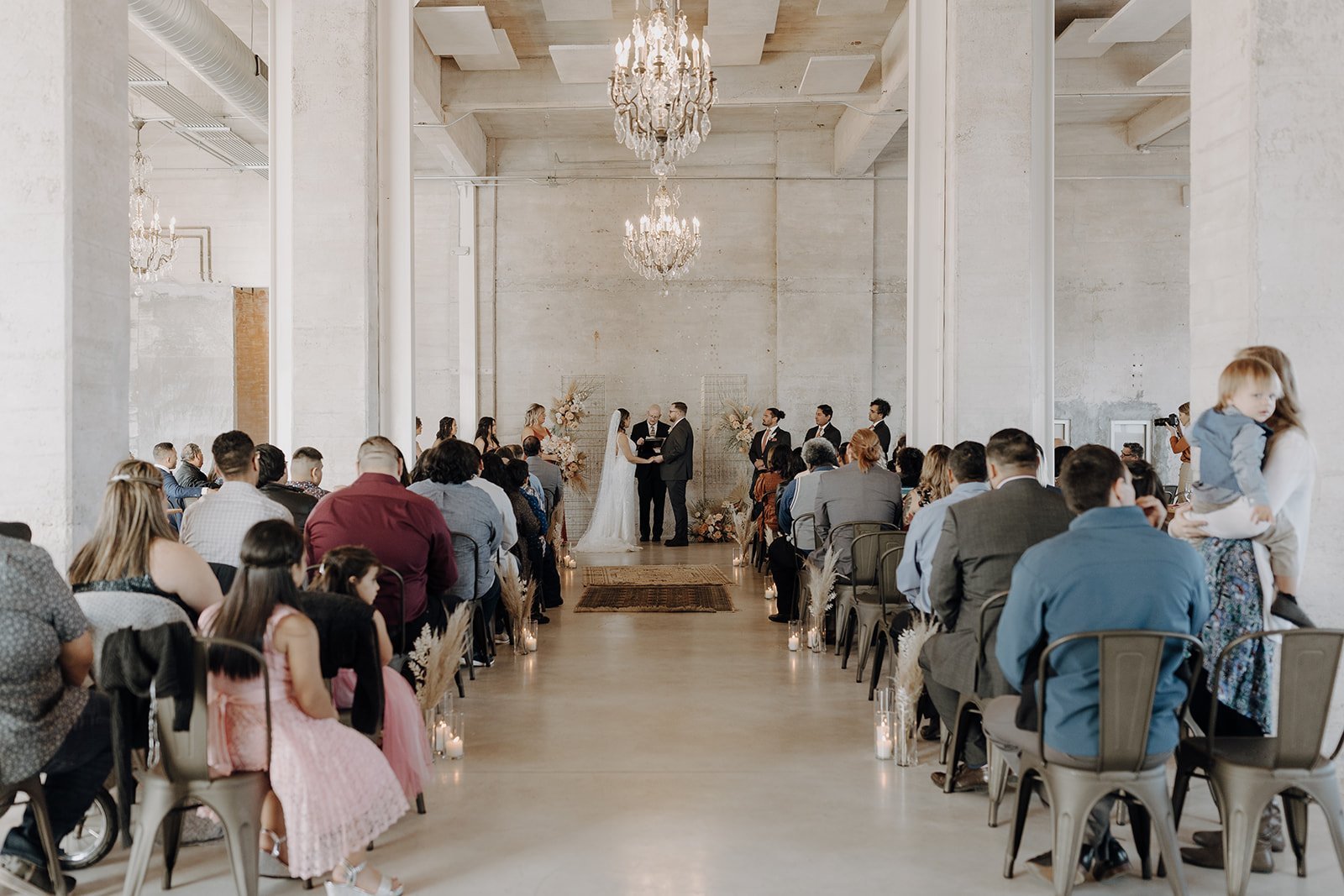 Wedding ceremony with guests at Austin wedding venue