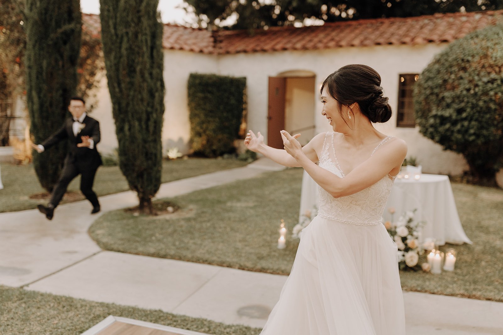 Bride and groom dancing at wedding reception