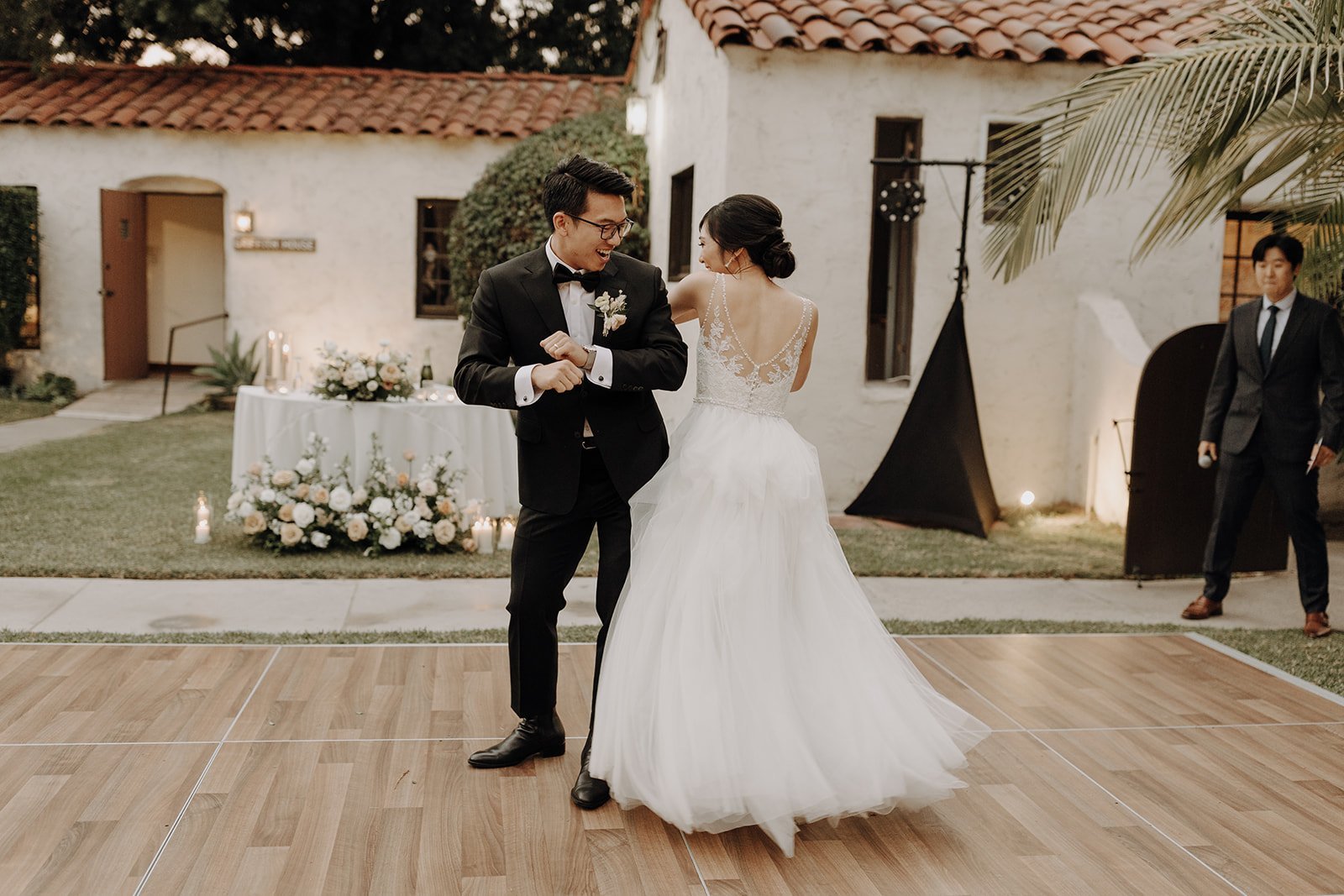 Bride and groom dancing at wedding reception