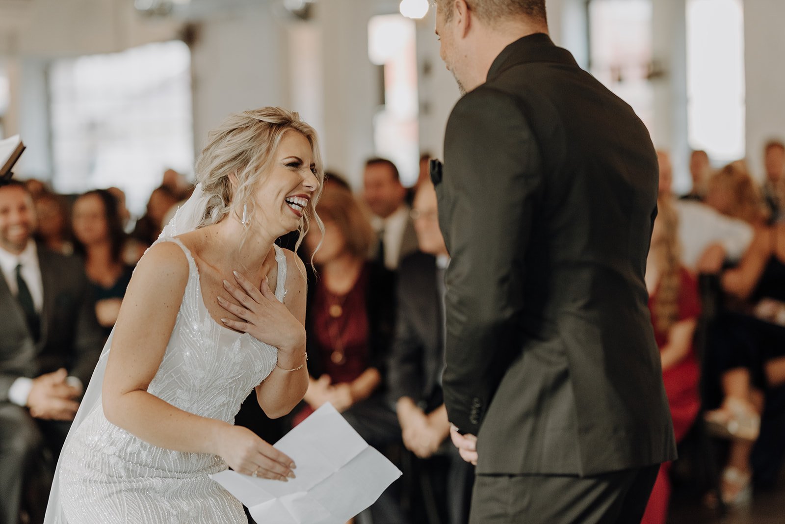 Bride laughing at wedding altar at non-traditional wedding in Illnois