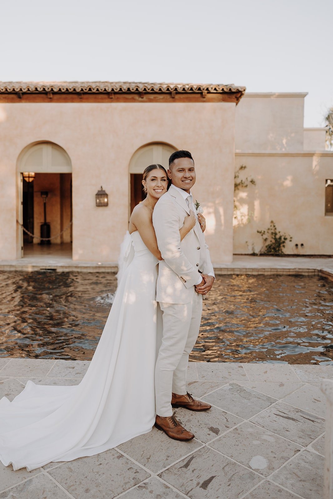 Bride and groom couple photos at luxury resort wedding in Arizona