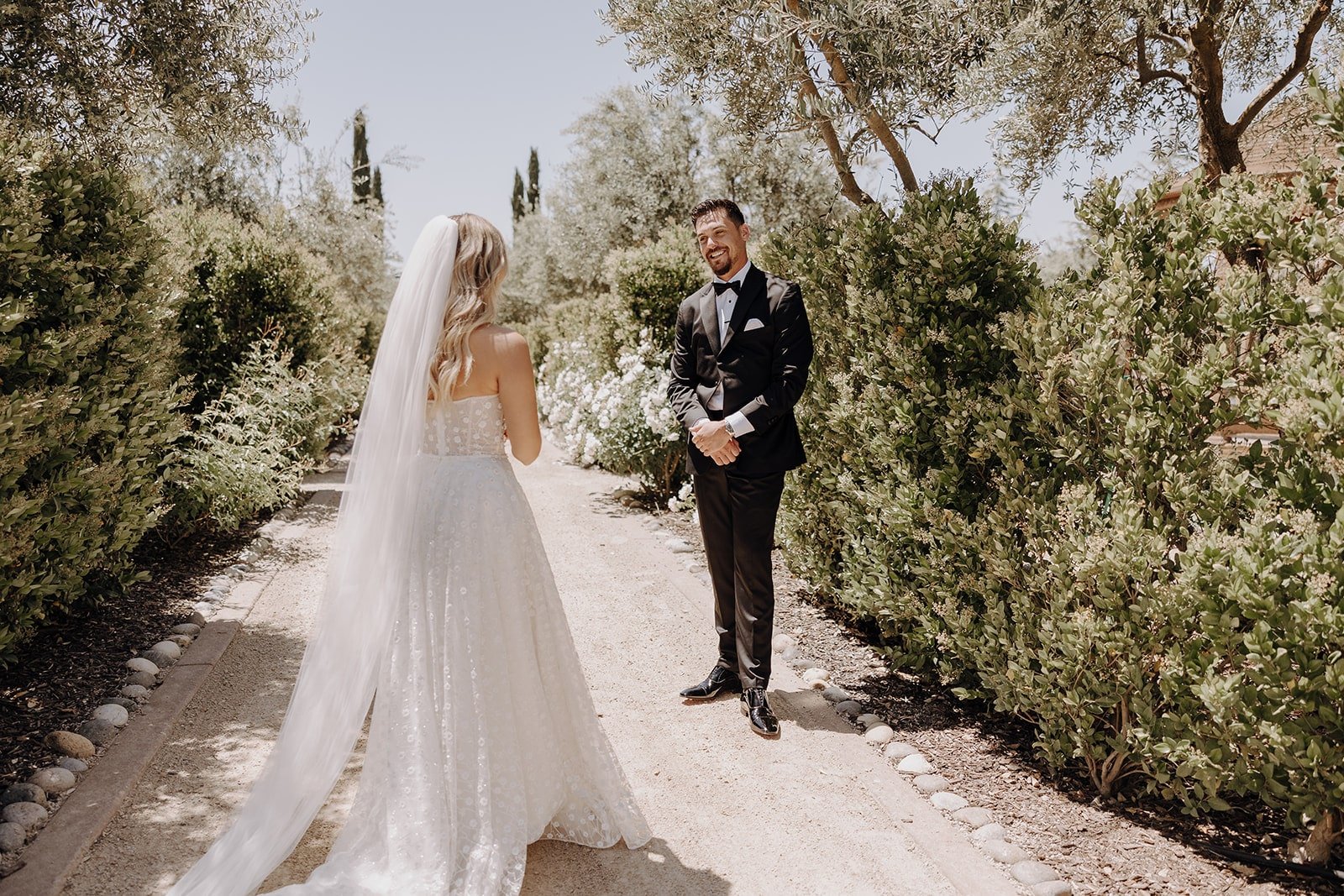Bride and groom first look at Tuscan-style wedding in California