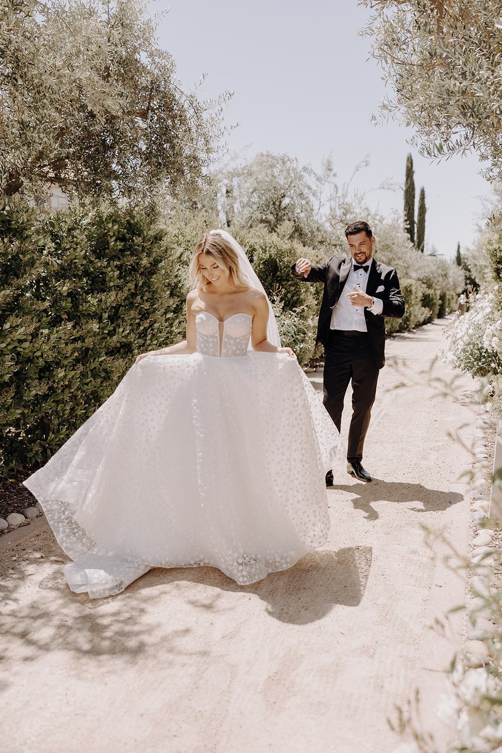 Bride twirls during first look at Tuscan-style wedding in California