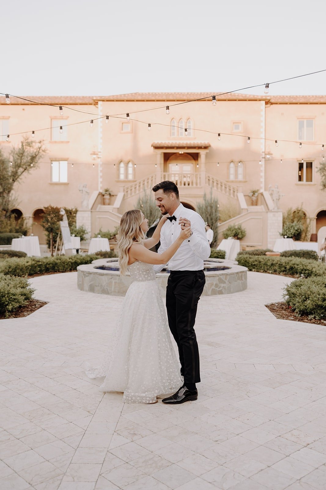 Bride and groom first dance at Tuscan wedding at Allegretto Vineyard Resort