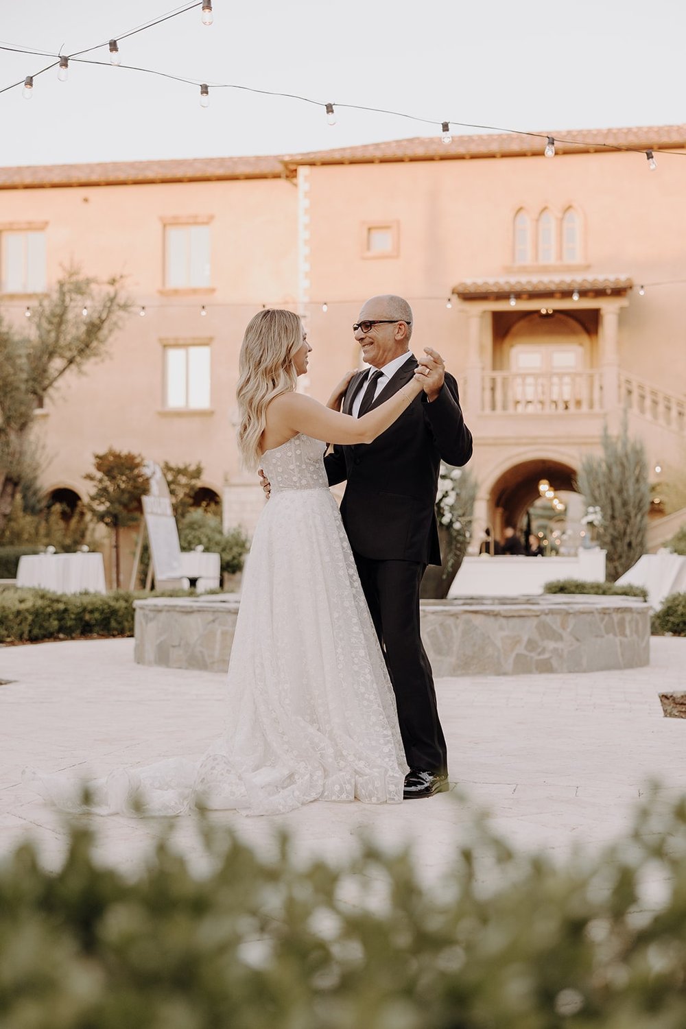 Bride first dance with father at Tuscan wedding venue in California