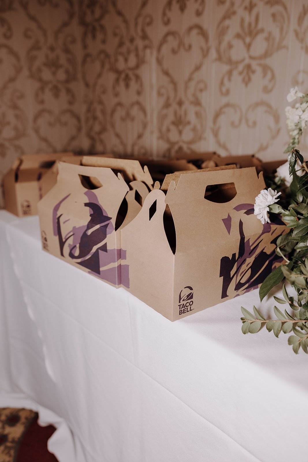 Taco Bell take away boxes at luxury wedding reception in California
