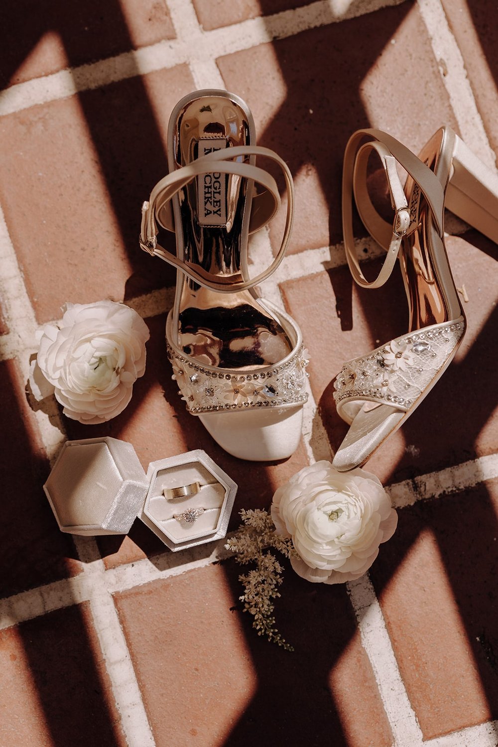 White heels with white ring box and flowers at Lairmont Manor wedding