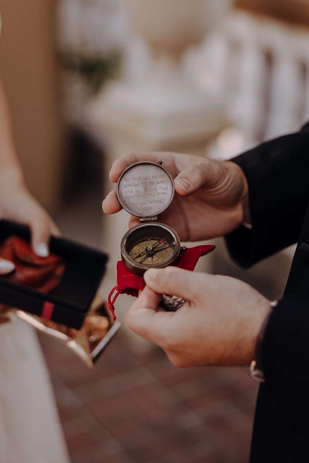 Bride and groom exchange gifts after first look at Washington wedding