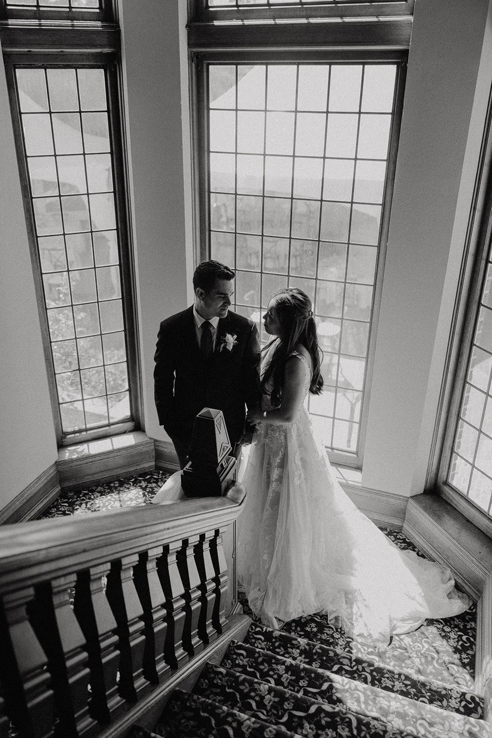 Wedding couple photos on the staircase at Lairmont Manor wedding