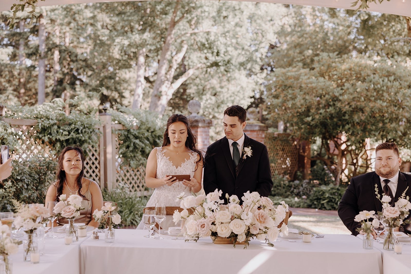 Bride and groom address their guests at Lairmont Manor wedding reception in Washington