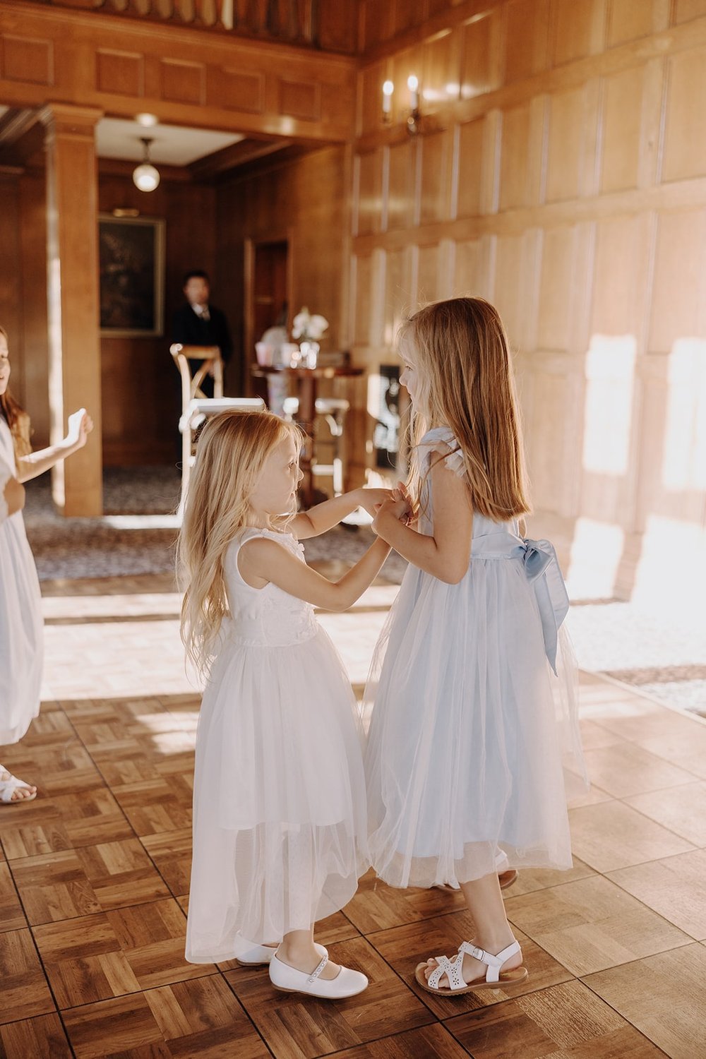 Two girls dance on the dance floor at Lairmont Manor wedding