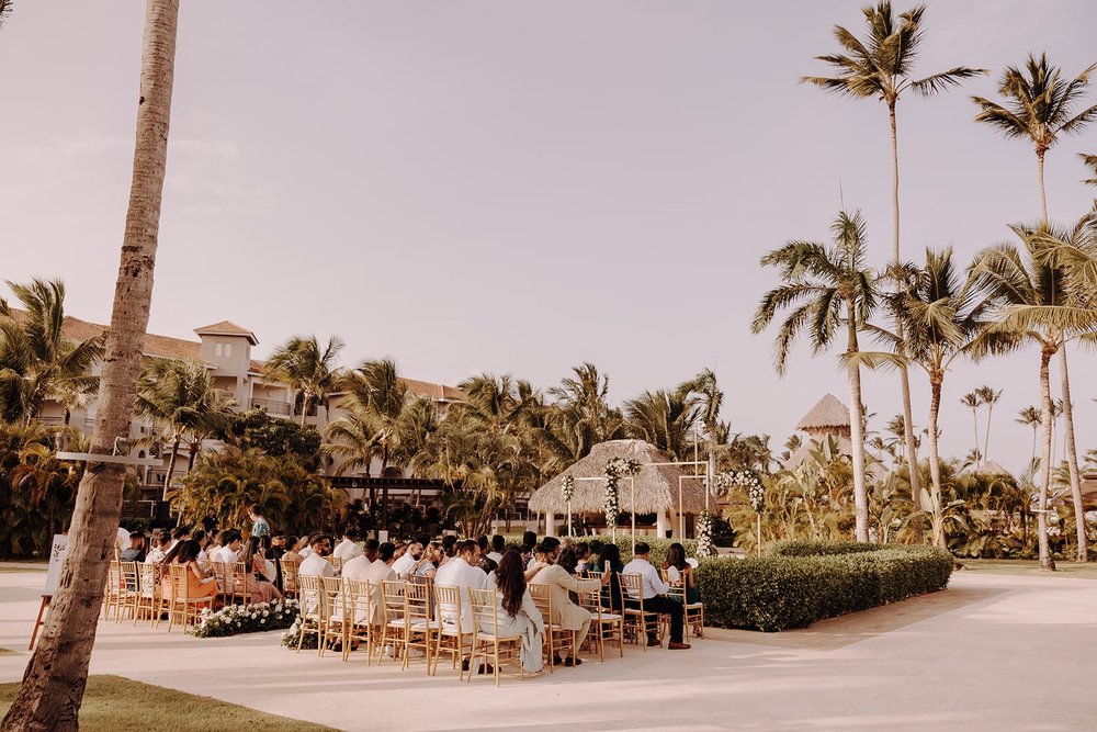 Guests sitting at destination wedding ceremony at Dreams Royal Beach Punta Cana