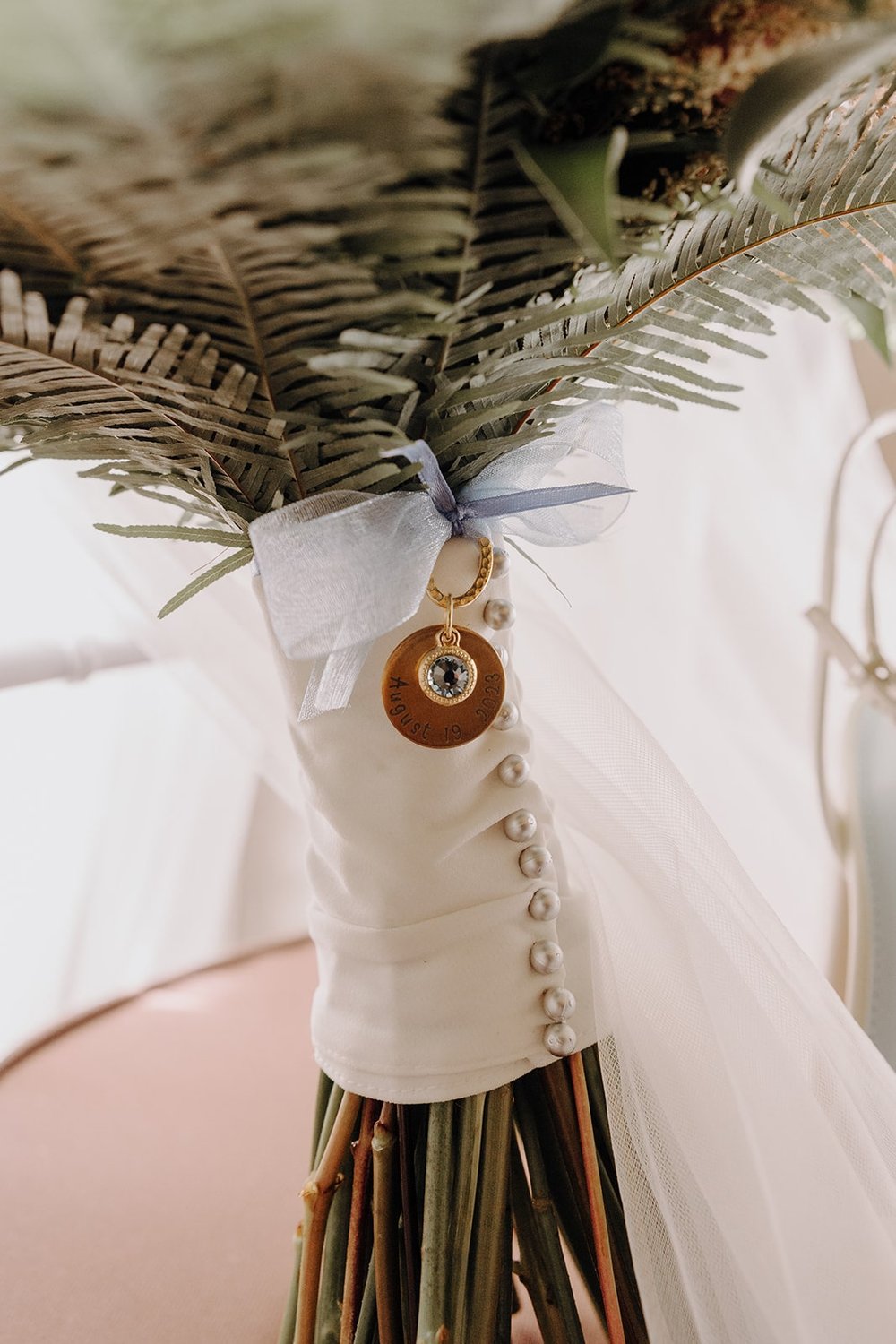 Something Blue details on wedding flower bouquet at New York wedding