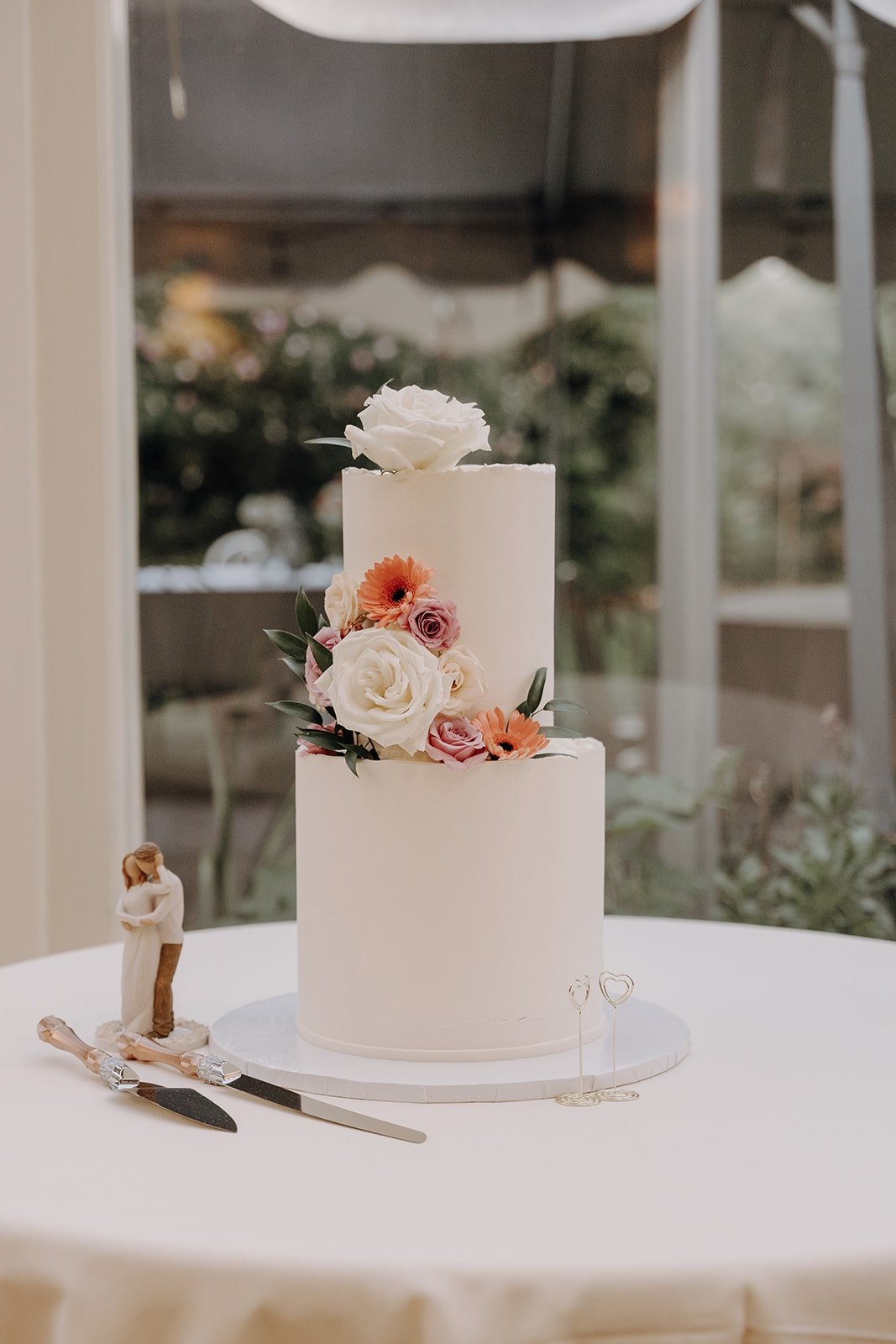 White two-tier wedding cake at New York wedding