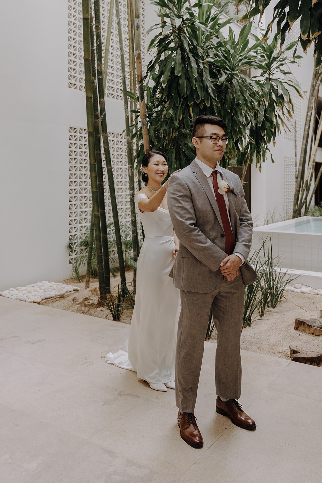 Bride and groom first look at Mexico resort wedding