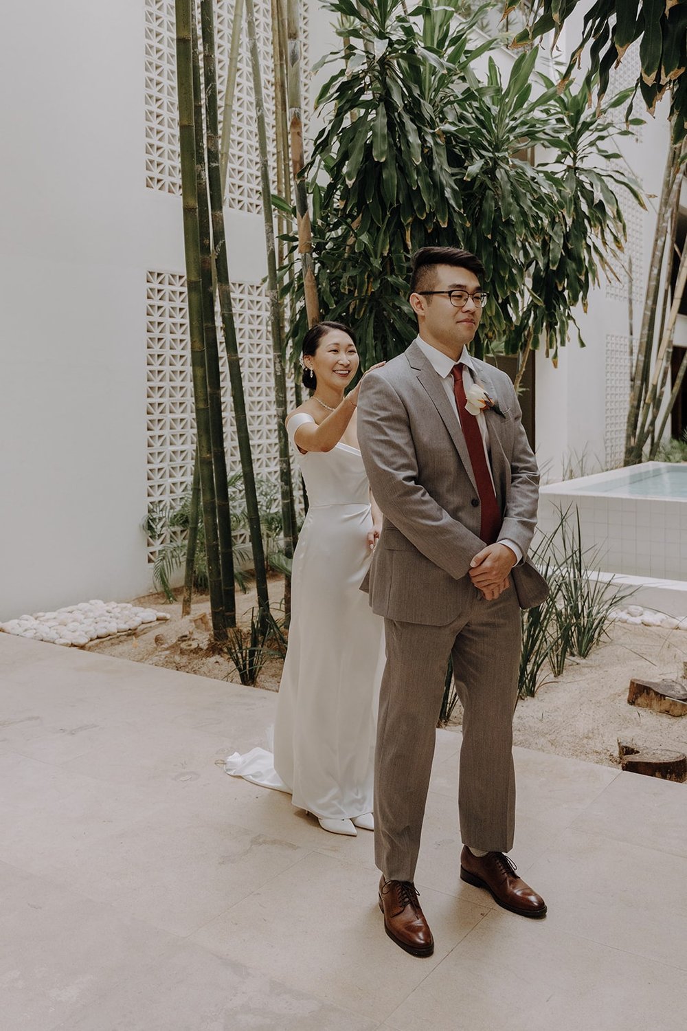 Bride and groom first look at Mexico resort wedding