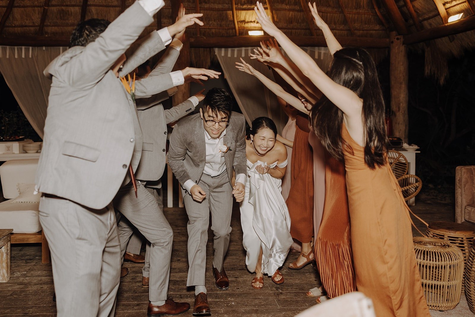 Bride and groom enter their wedding dance floor at their Cancun resort wedding