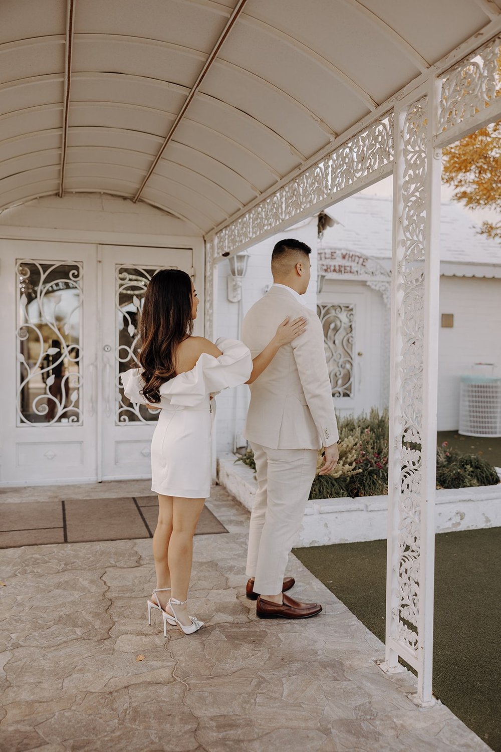 Bride and groom first look at the Little White Chapel in Las Vegas
