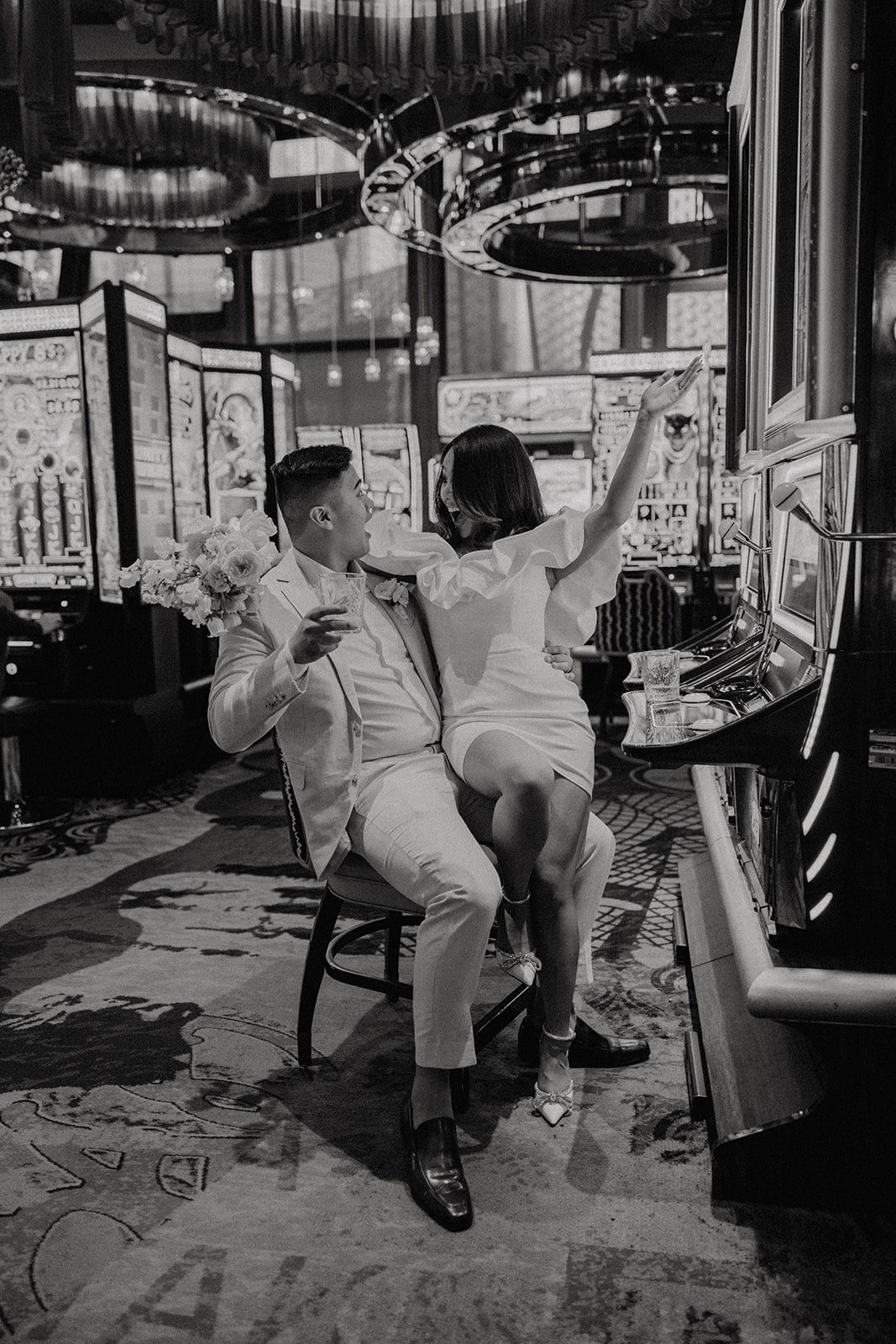 Bride and groom play in a Casino during their Las Vegas elopement