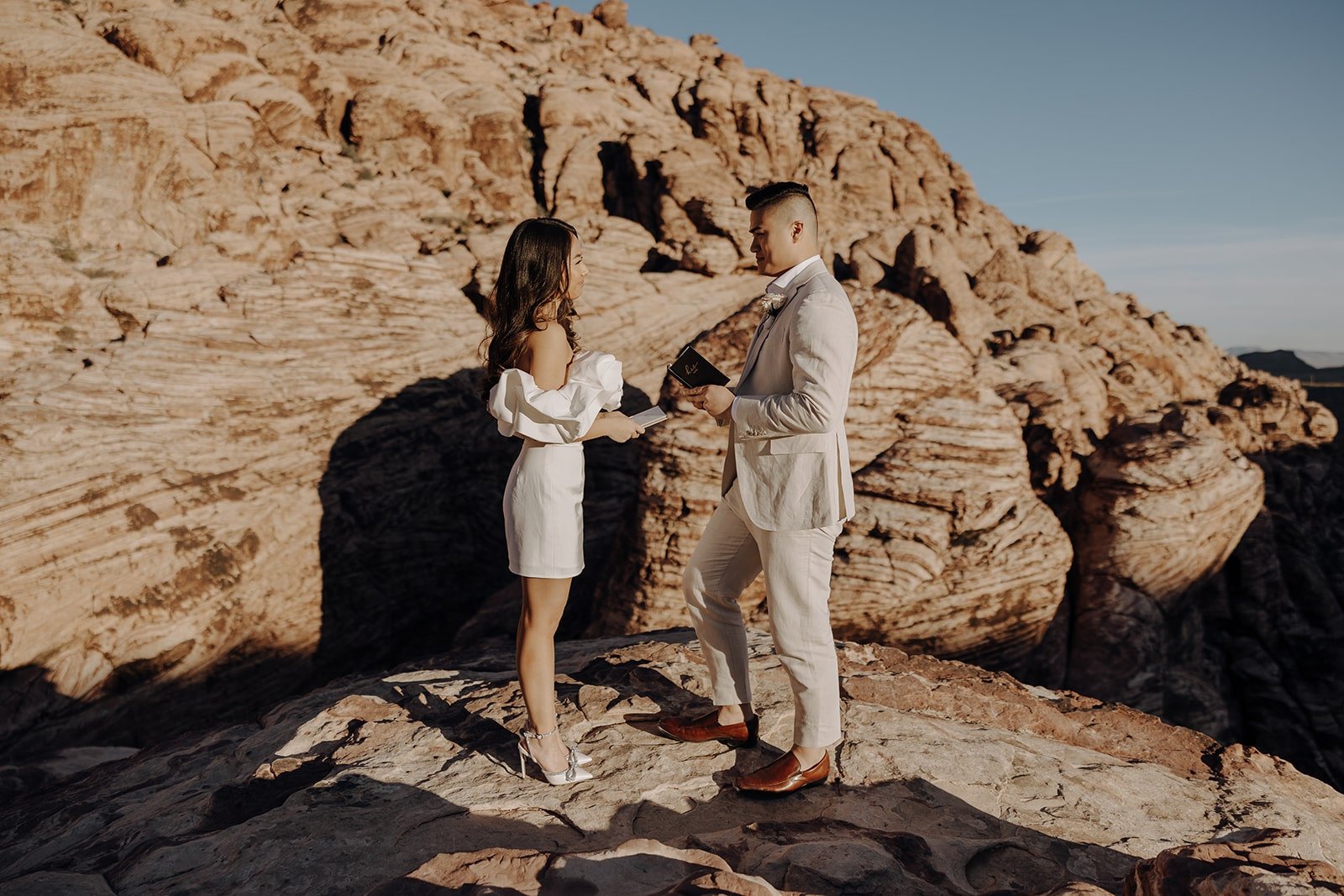 Bride and groom exchange personal vows at Red Rock Canyon